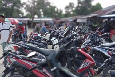 Mulai Hari Ini Tarif Parkir Motor dan Mobil di Pasar Tradisional Pekanbaru Turun